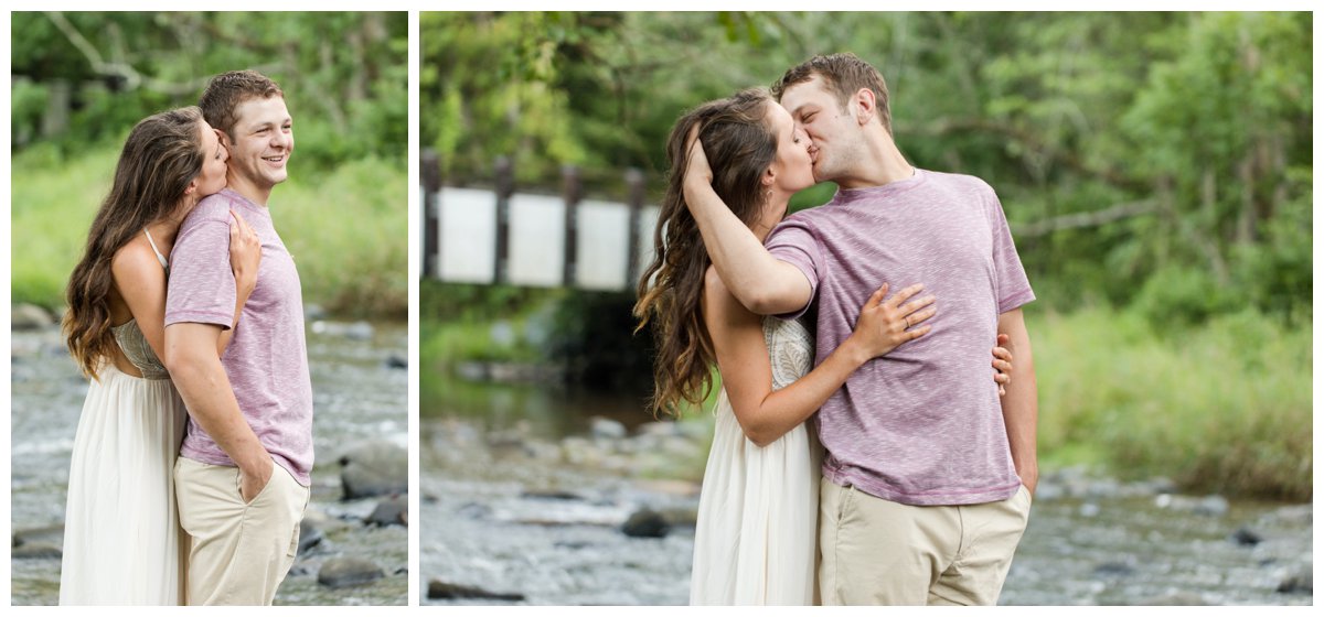 Jerusalem Mills Bohemian Engagement Photography in a stream in a white dress while kissing