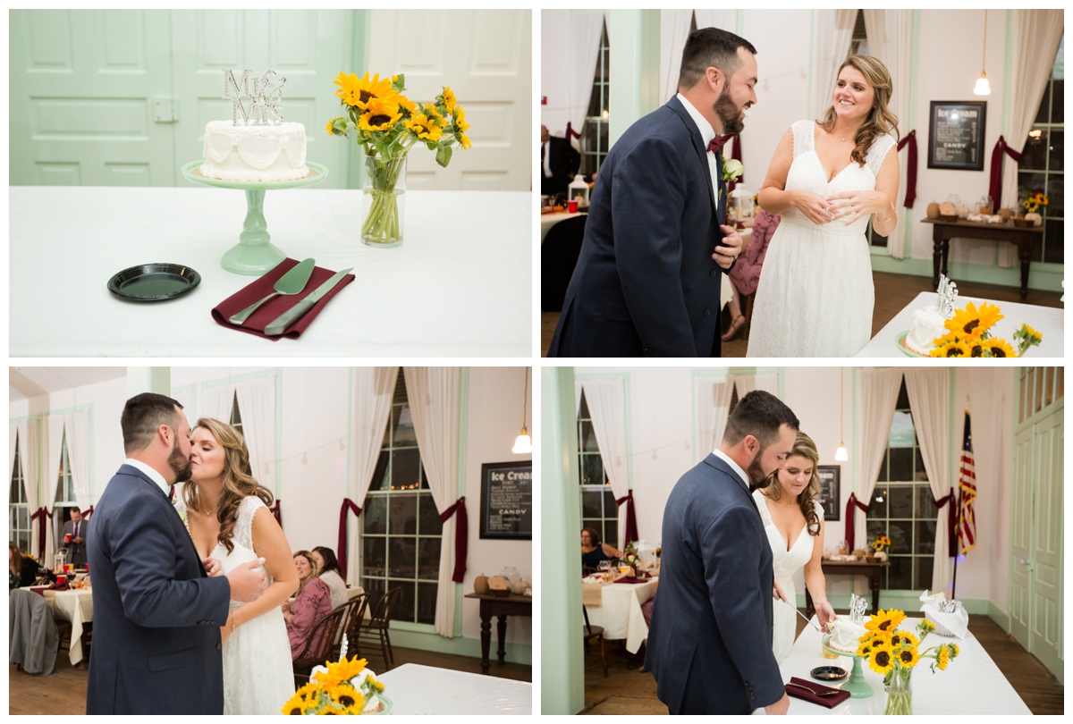 Cake cutting at fall wedding with small cake and sunflowers