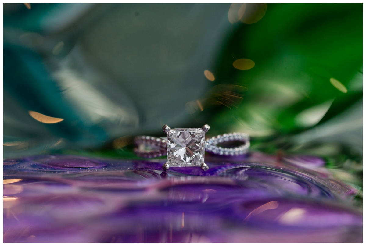 Ellicott City Engagement Photo by train bridge. Old Ellicott City. Engagement ring on dish by shops