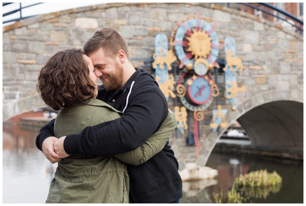 Engaged Couple with Disney Themed Frederick Maryland Engagement Photos by the bridge