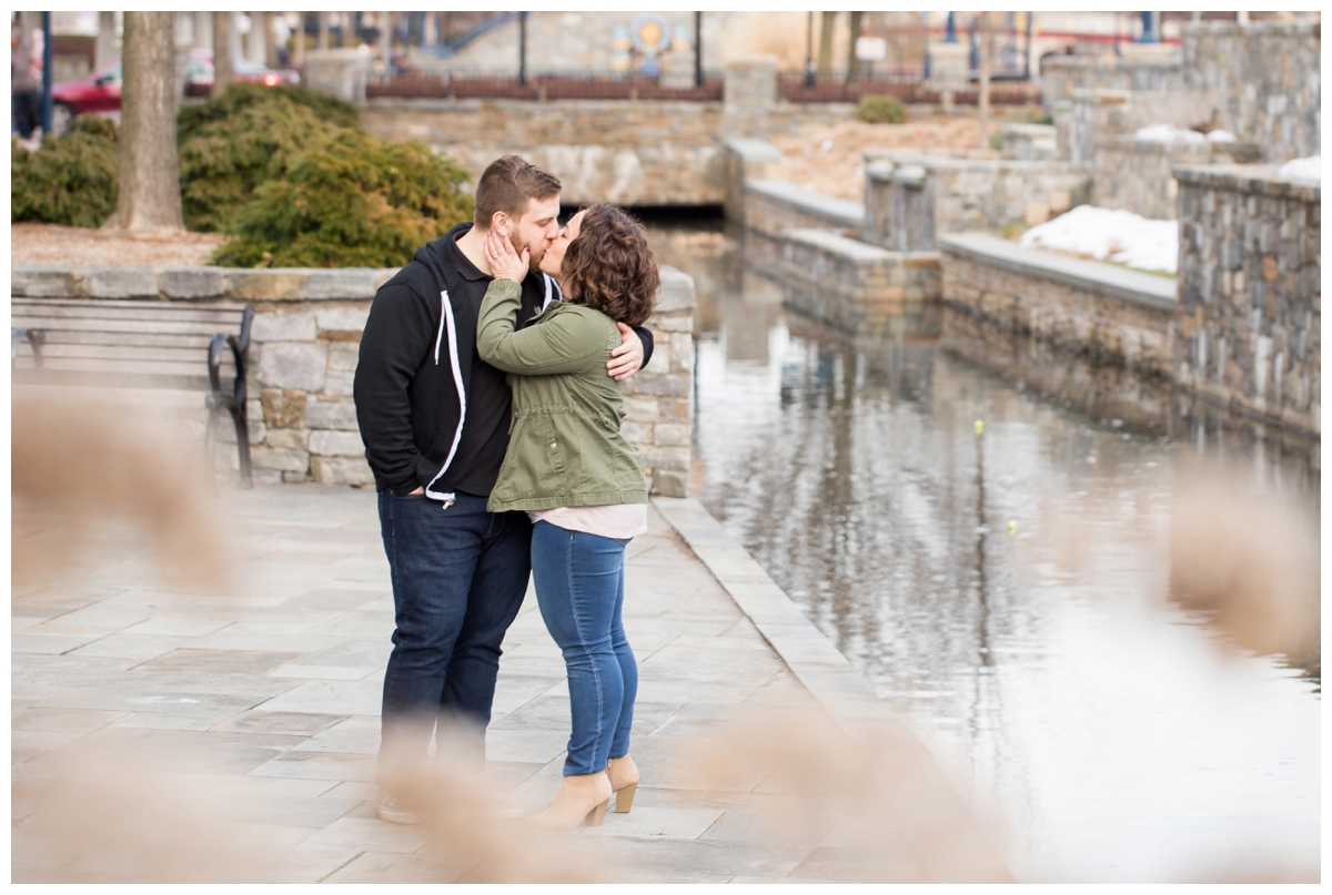 Engaged Couple with Disney Themed Frederick Maryland Engagement Photos by the canal