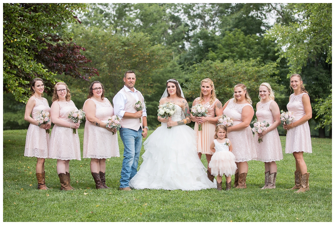 Bridal party posing in dusty rose bridesmaid dresses and rose bouquets. Bridesman with bouquet. Maryland wedding at Circle D Farm in Woodbine. Maryland Wedding Photographer