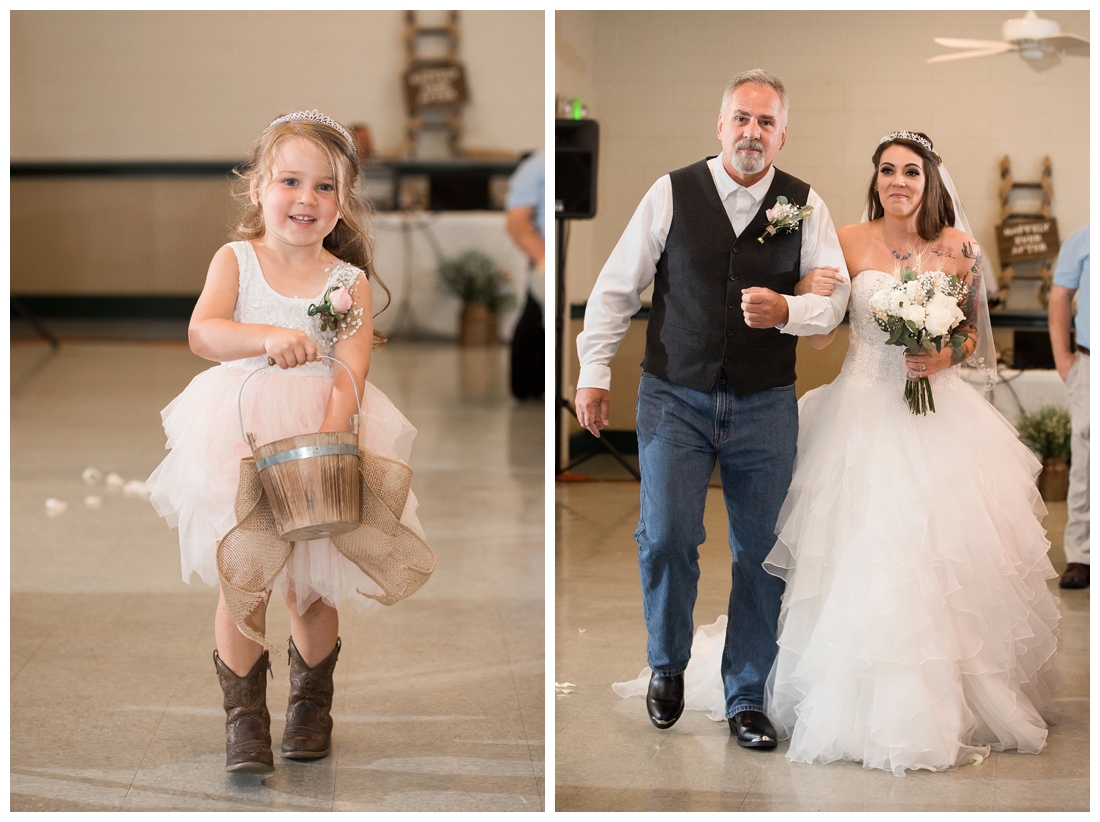 Indoor wedding ceremony. Flower girl in cowgirl boots. Bride and her father in the aisle. Maryland wedding at Circle D Farm in Woodbine. Maryland Wedding Photographer