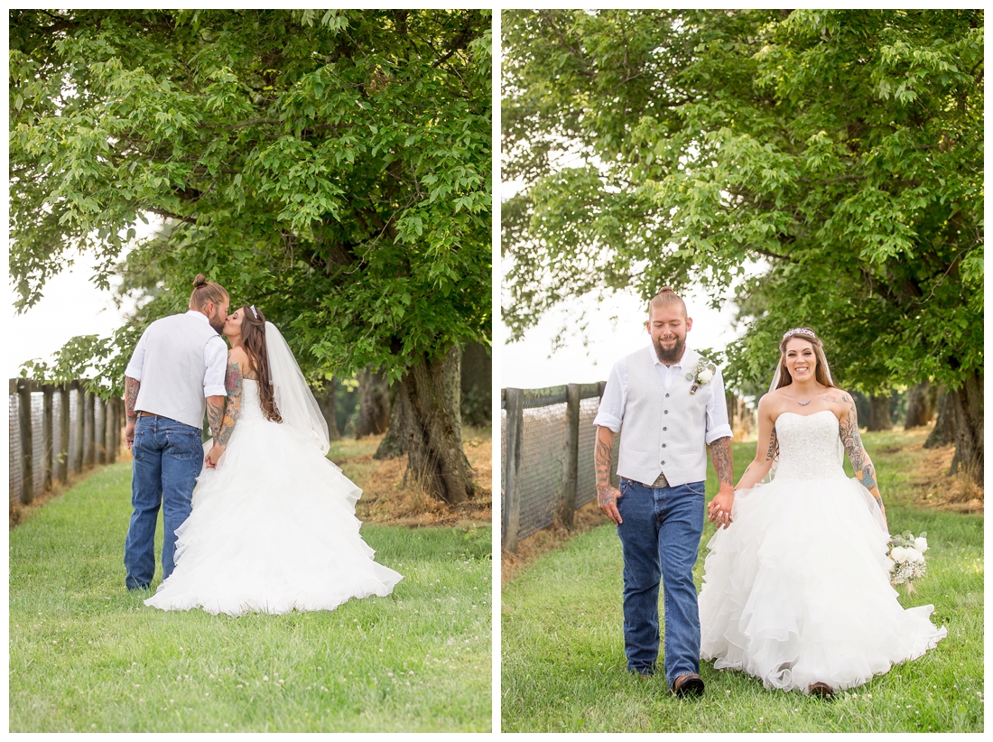 Outdoor bride and groom portraits. Bride and groom kissing under a tree. Maryland wedding at Circle D Farm in Woodbine. Maryland Wedding Photographer. Bride and Groom kissing and walking