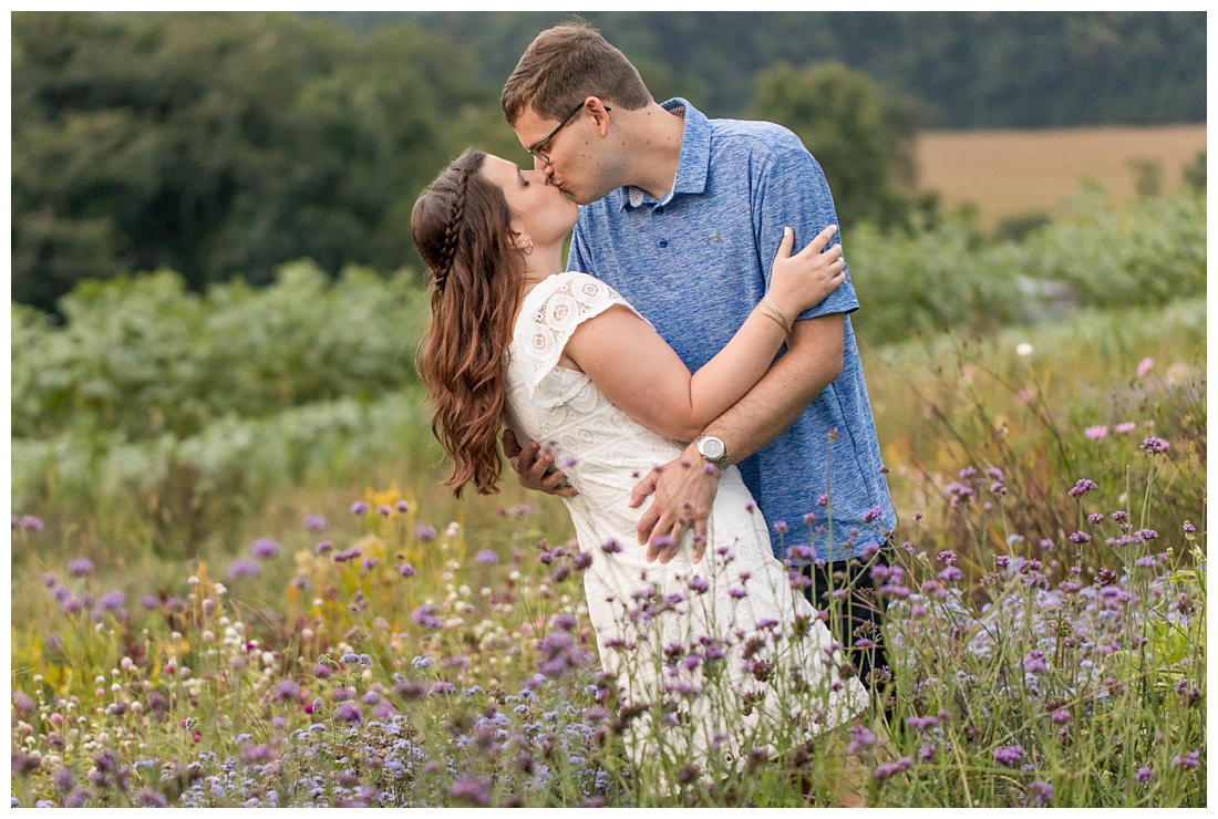 Maryland Wedding Photography Sunflower engagement photos. Maryland engagement. Bride and groom to be in flower fields. Flower fields maryland farm engagement photos.