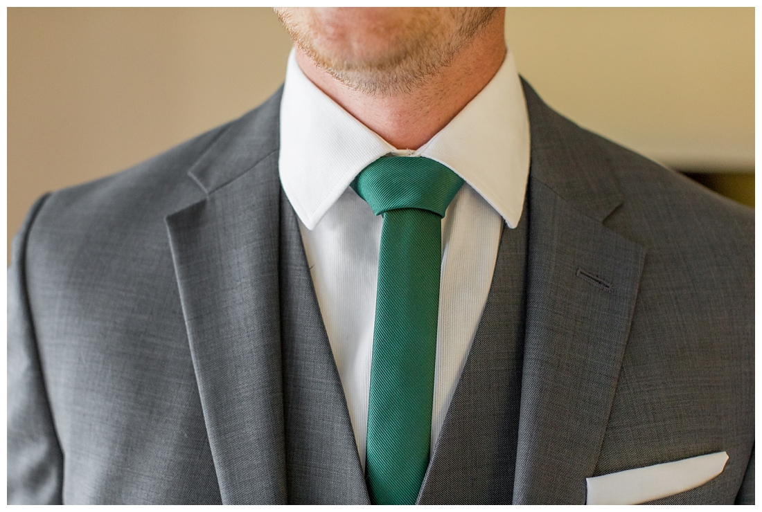 Towson Maryland Catholic Church Ceremony. Joppa Maryland Mountain Branch Golf Club Wedding. The Belvedere bridal wedding preparation. Groom's emerald tie