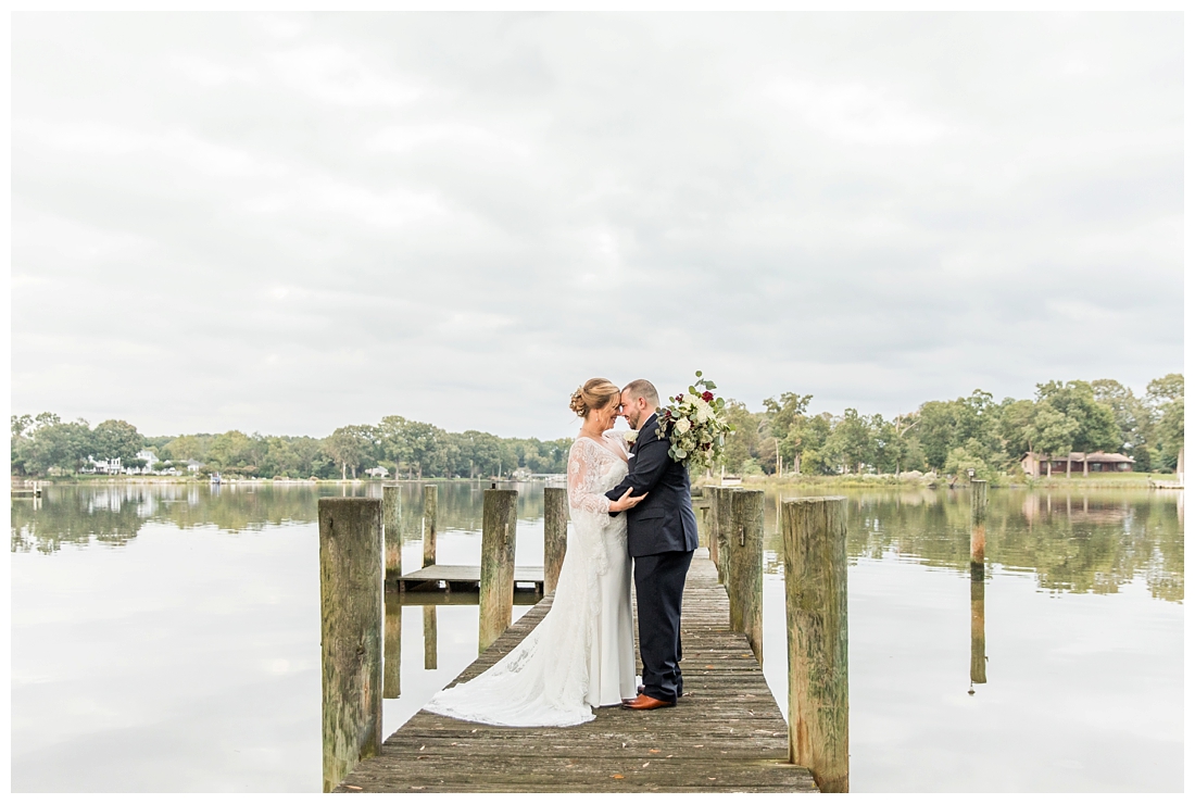 Eastern Shore Wedding. Water Front Wedding. Maryland Wedding. Queenstown Maryland. Fall October Wedding. Burgundy and Navy wedding colors. Maryland Wedding Photographer, Annapolis Wedding Photographer. Wedding at private residence, wedding at our home, tent wedding. bride and groom portraits on a pier