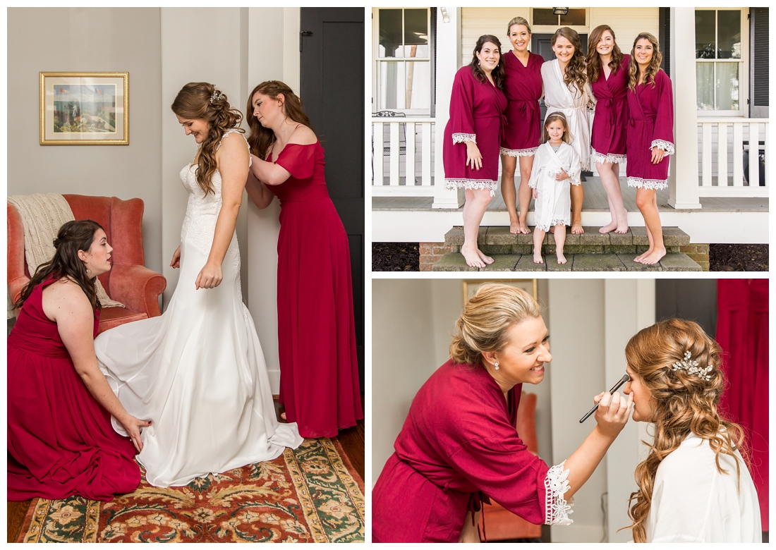 Frederick Maryland McClintlock Distillery Wedding. Frederick Wedding. Distillery Wedding. Cottage getting ready. Air bnb wedding day. Burgundy and Navy wedding color scheme. Bride putting on wedding dress. Bridal party robes. Burgundy Robe. 