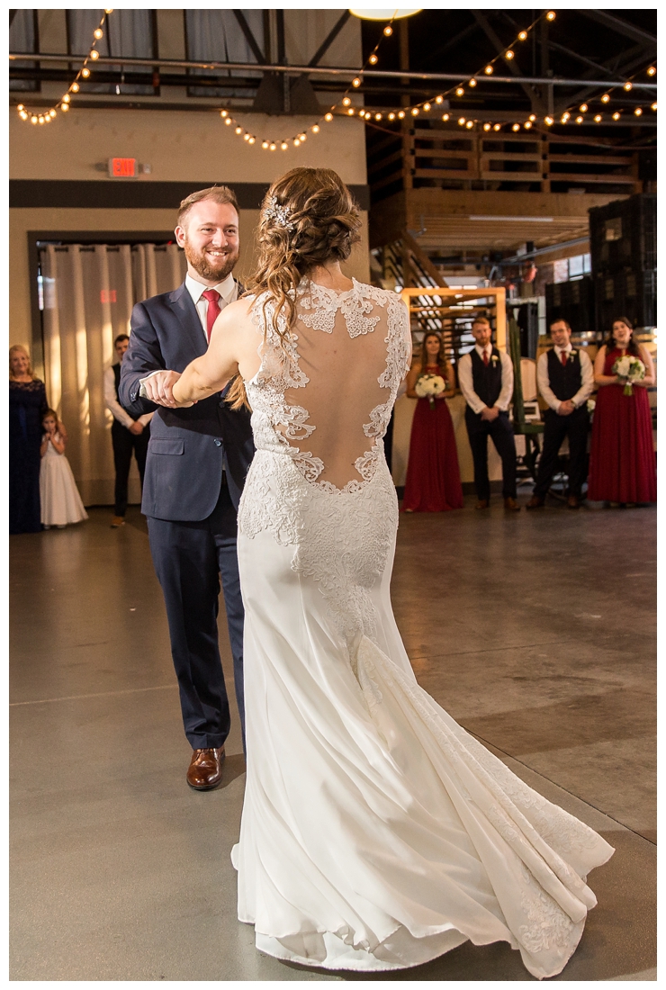 Frederick Maryland McClintlock Distillery Wedding. Frederick Wedding. Distillery Wedding. Cottage getting ready. Air bnb wedding day. Burgundy and Navy wedding color scheme. bride and groom share their first dance