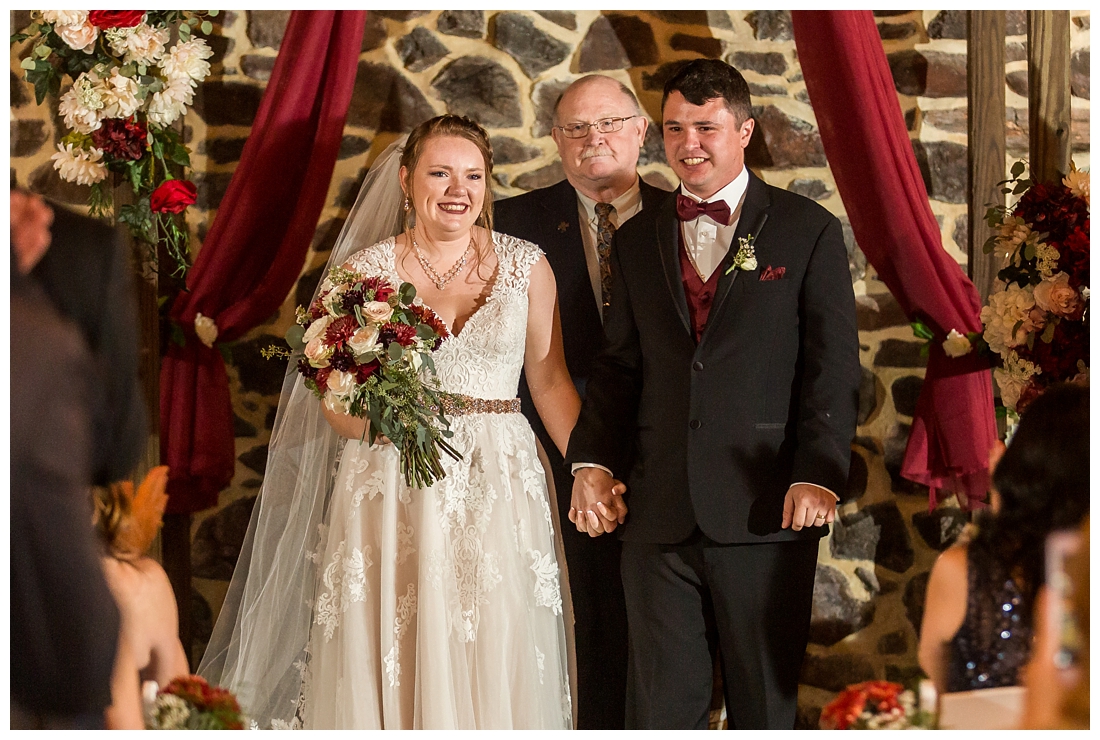 Vineyards of Marys Meadow Wedding in Darlington Maryland. Rainy fall wedding. Cold wedding day. Rainy wedding day. maryland wedding photographer. Barn wedding. Farm Wedding. wedding ceremony in the barn. Newlyweds. 