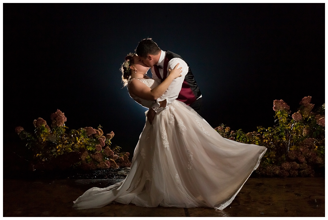 Vineyards of Marys Meadow Wedding in Darlington Maryland. Rainy fall wedding. Cold wedding day. Rainy wedding day. maryland wedding photographer. Barn wedding. Farm Wedding. Bride and Groom rainy night portraits. Night wedding portraits. Off camera Flash. Maryland wedding night portrait. Night portrait photographer