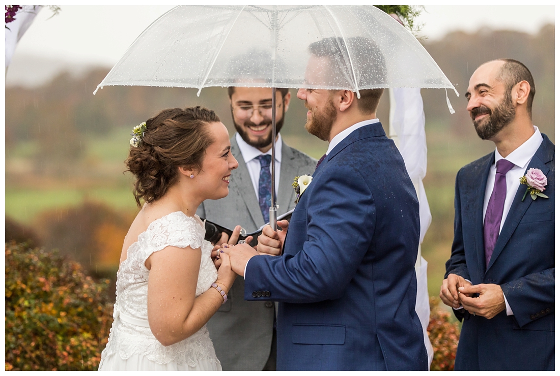 Fall wedding frederick maryland. PB dye golf club wedding. purple and navy wedding. disney themed wedding. rainy wedding day. rainy outdoor ceremony. Rain during the ceremony. Corgi cake topper.