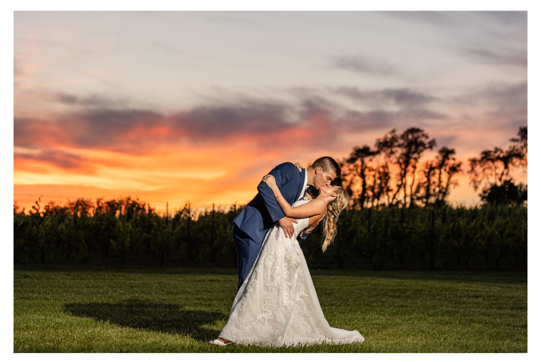 Summer wedding at Black Ankle Winery. Junior best men, gymnast dancing, mauve and navy wedding colors, double rainbow at wedding, sparkler send off