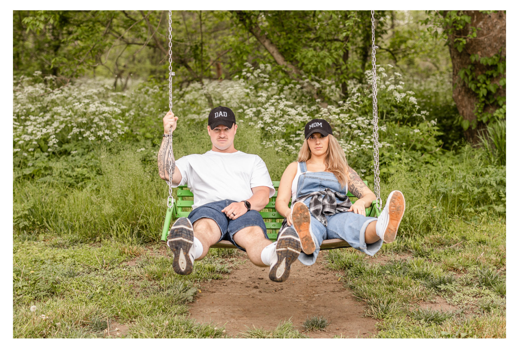 90's theme. 90's photo session. 90's awkward photos. 90's couple photos. 90's couple portraits. 90's couple glamour shots. 90's pregnancy announcement. new pair of genes. Jean overalls. Jorts. Dad Jeans. Mom Jeans. New balances. Awkward Couple Poses. Awkward portrait session.